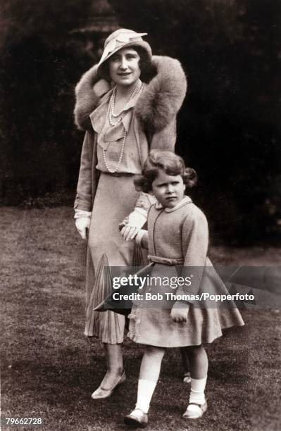 British Royalty, circa 1931, H,R,H,Princess Elizabeth , daughter of The Duke and Duchess of York pictured walking with her mother The Duchess of York