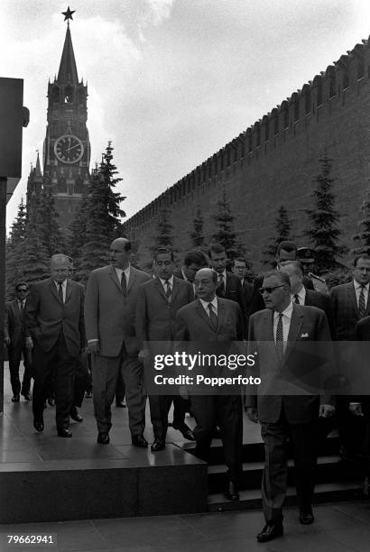 Moscow, Russia, 28th June 1970, Gamal Abdel Nasser , the United Arab Republic President, walks past the Kremlin with a large group of officials...