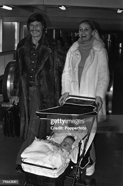 London, England, 22nd January 1972, American Film actor Charles Bronson with his actress wife Jill Ireland and their 7 month old daughter Zuleika...