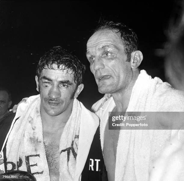 Sport, Boxing, London, England, 20th November 1970, Great Britain's Henry Cooper consoles Spain's Jose Urtain who he beat after the referee stopped...
