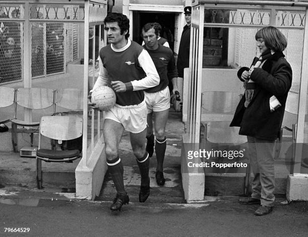 Football, English League Division One, London, England, 12th February 1972, Arsenal v Derby County, Arsenal captain Frank McLintock followed by...