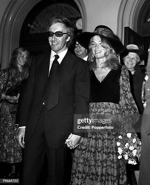 24th August 1970, London, England, British comedian and actor Peter Sellers is pictured with his bride Miranda Quarry after they married at Caxton...