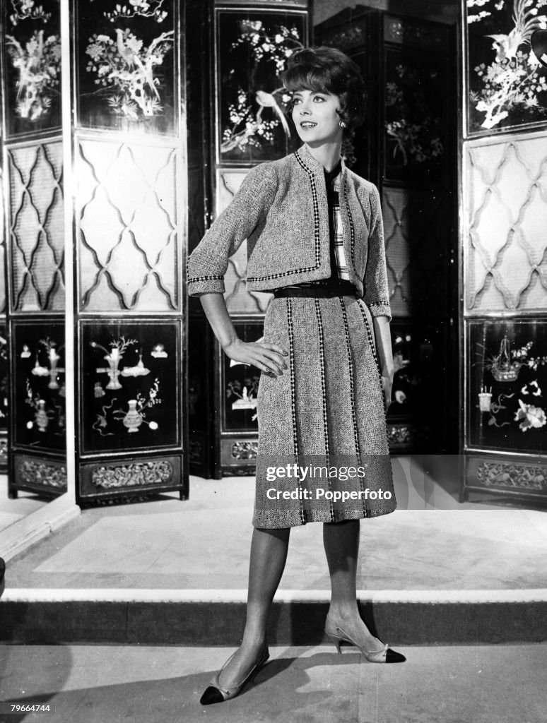 17th February 1961, Paris, France, A model shows a black and white Tweed suit as part of Chanel+s Spring collection