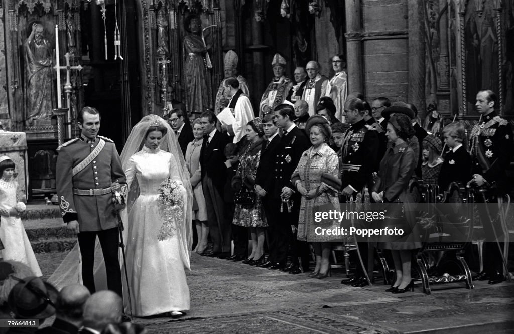 London, England, 14th November, 1973, HRH Princess Anne and captain Mark Phillips walk past members of the Royal family after their wedding service at Westminster Abbey