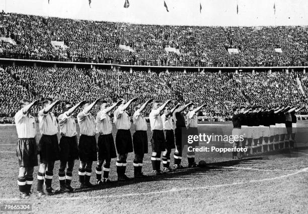 Pre-World War II, Football, 15th May 1938, Prior to their International football match in Berlin+s Olympic stadium, the England team gave the nazi...