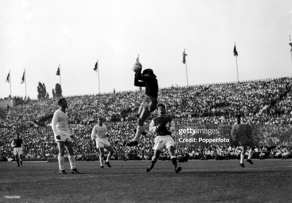 Football, 8th June 1959, Stuttgart, Germany, European Cup Final, Real Madrid 2 v Stade Reims 0, Real Madrid goalkeeper Dominguez leaps to save from Reims Centre Forward Just Fontaine, The Final was won by Real Madrid for the 4th consecutive time
