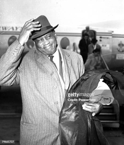 9th March 1959, American singer Paul Robeson arriving at London airport, he is to play Othello this season at Stratford-on-Avon