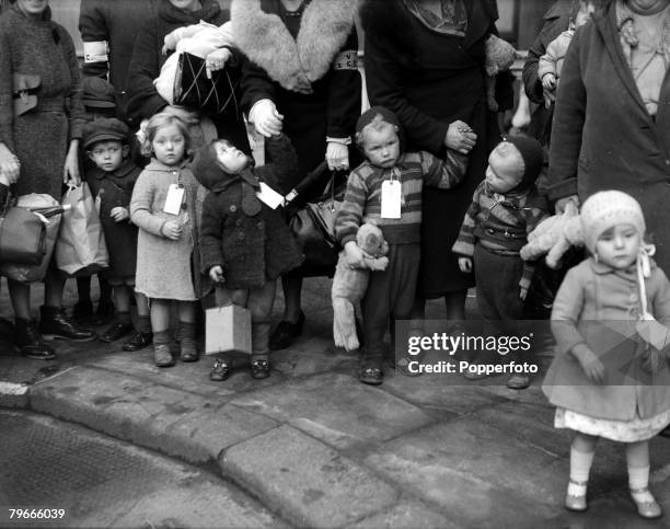 World War II, 1st November 1940, London, England, Mothers and children arriving at a London Station for evacuation to the country during The Blitz.