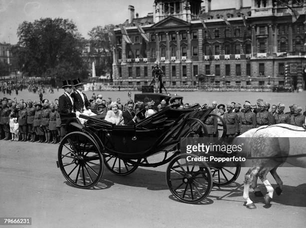24th May 1937, London, England, King George VI and Queen Elizabeth en route to St Pauls Cathedral for an Empire Day Thanksgiving Service