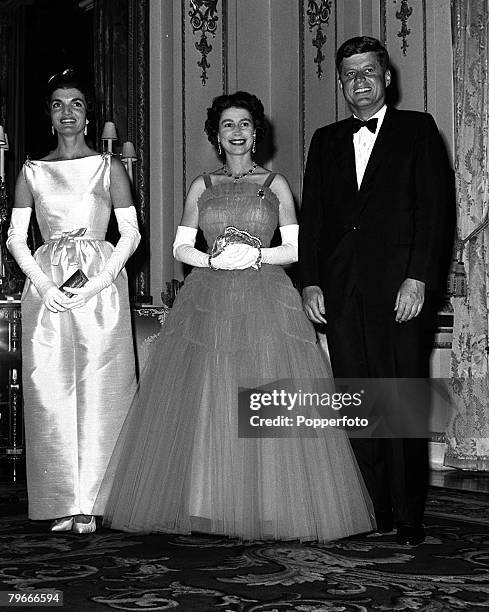 5th, June American President, John F Kennedy, with first lady Jaqueline Kennedy, pictured at Buckingham Palace with Queen Elizabeth II