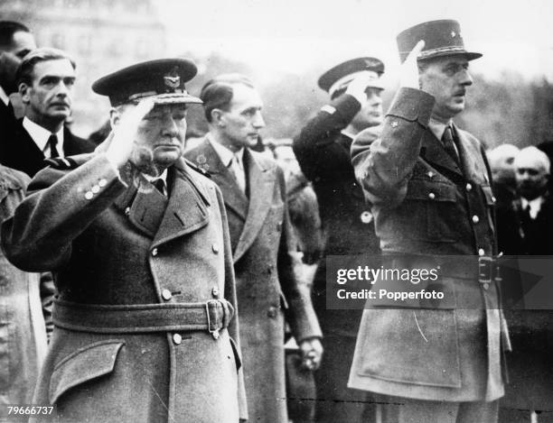 Paris, France, 13th November British Prime Minister Winston Churchill and General Charles De Gaulle salute the tomb of France's Unknown Soldier...