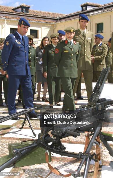 Prince Felipe and Princess Aisha of Jordan inspect the Royal Guard at the Pardo Palace.