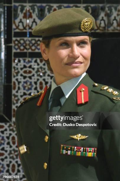 Portrait of Princess Aisha of Jordan in military dress, at the Pardo Palace in Madrid.