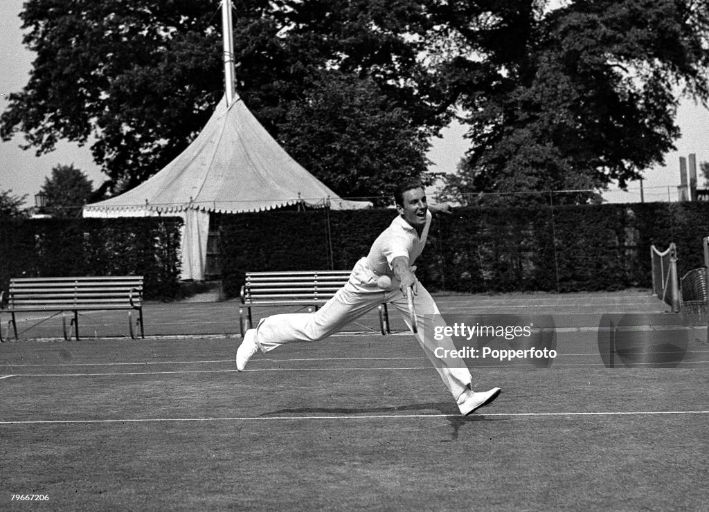 London, England, 15th June 1932, English Tennis star Fred Perry, training on Wimbledon grass courts