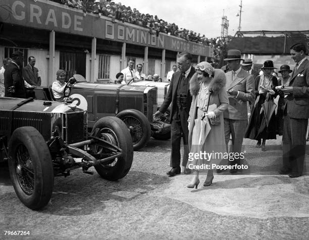 Brooklands, Surrey, England, 2nd July 1932, The Duke and Duchess of York inspecting cars at the Brooklands Track Gala in aid of the Guy's Hospital