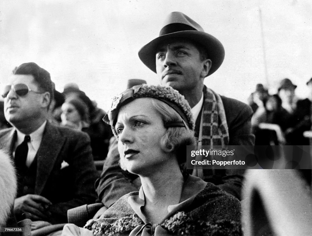 10th, December, 1931, US Actress Carole Lombard watches polo with her husband William Powell at Santa Monica, California, USA