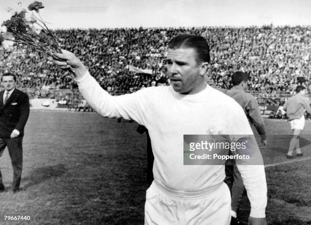 14th, May Ferenc Puskas of Real Madrid, pictured throwing flowers to fans prior to the AEK Athens v Real Madrid game in Athens, The match finished in...