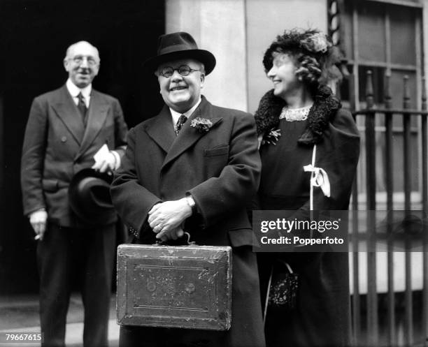 London, England, 12th April Sir Kingsley Wood, Chancellor of the Exchequer, leaving Downing Street for the House of Commons to make his budget speech