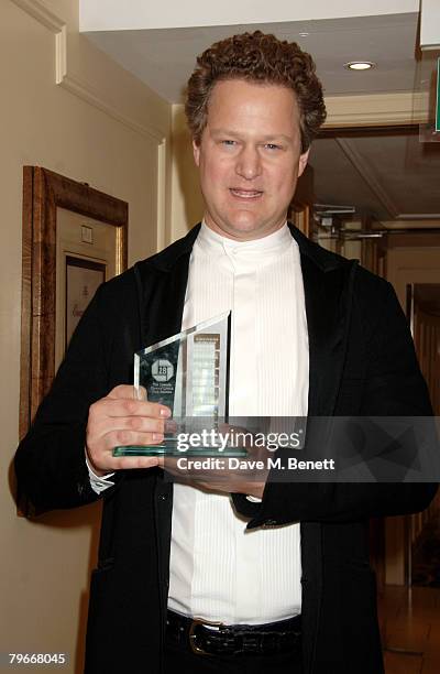 Florian Henckel von Donnersmarck poses in the awards room with the Screenwriter of the Year Award during the Awards Of The London Film Critics Circle...