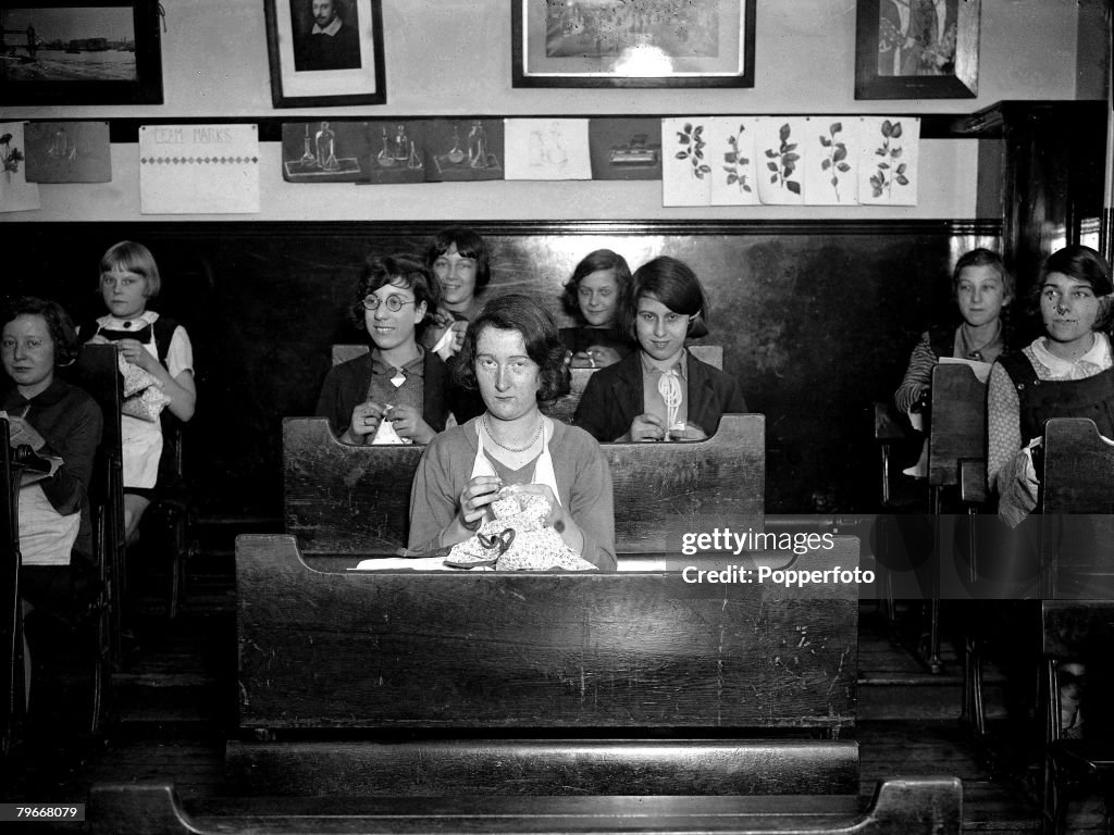 London, England, 23rd October1930, A scene showing pupils sitting at their desks inside a classroom at a Brixton school