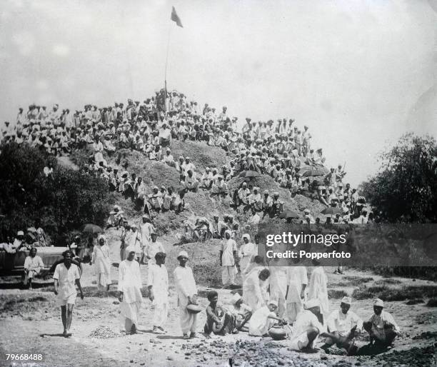 Kapadwamj, India, 6th May Gandhi volunteers in camp at Kapadwanj watching members of their band making salt following the civil disobedience riots...