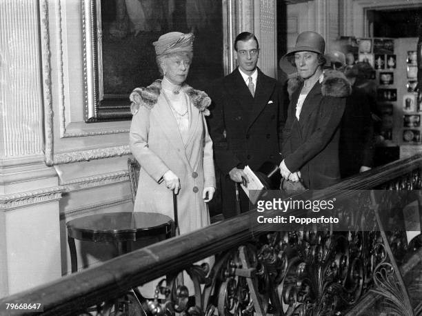 July Queen Mary with Prince George and Princess Marie Louise at a London silver exhibition