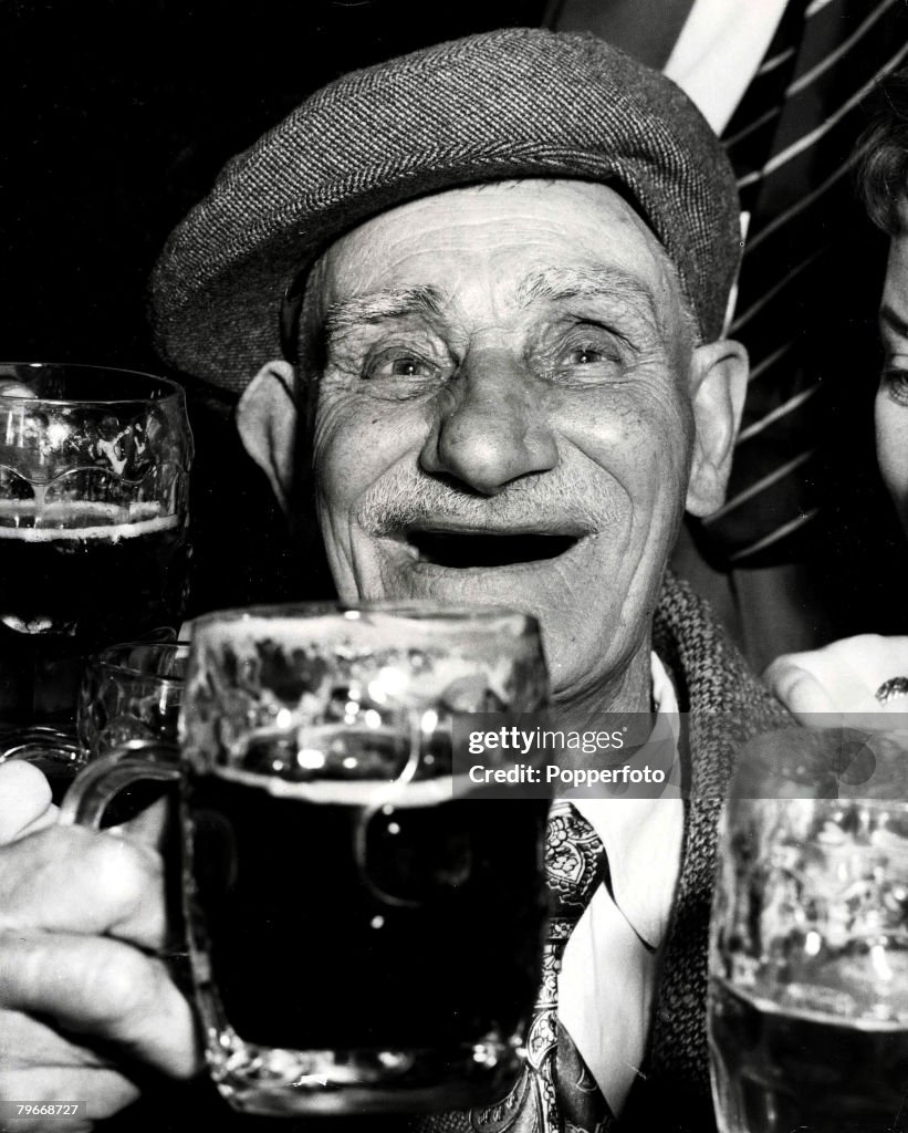 Volume 2, Page 78, Picture 10, A centenarian, (elderly male) celebrates his birthday with a pint of beer, 7th November 1958