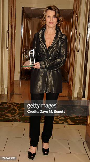Julie Christie poses in the awards room with the British Actress of the Year Award during the Awards Of The London Film Critics Circle, at the...