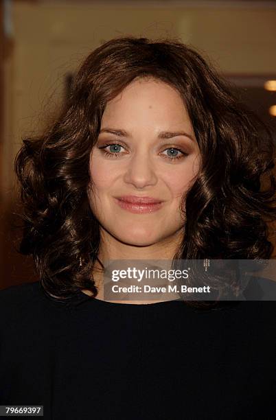 Marion Cotillard poses in the awards room with the Actress of the Year Award during the Awards Of The London Film Critics Circle, at the Grosvenor...