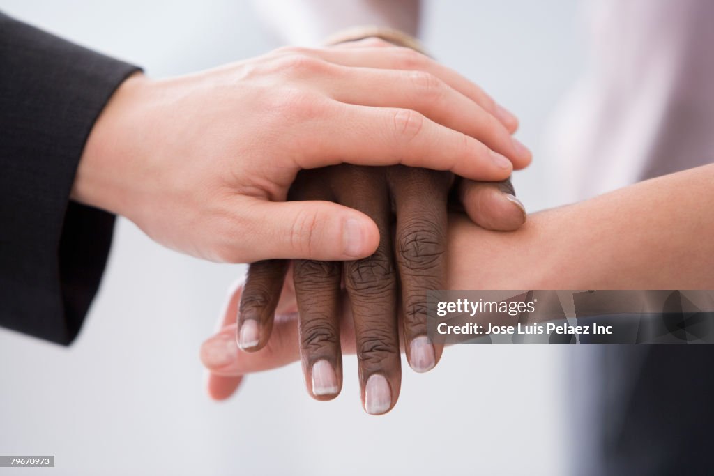 Hands Restting Close Up Of Multiethnic Hands Resting On Each Other High-Res Stock ...