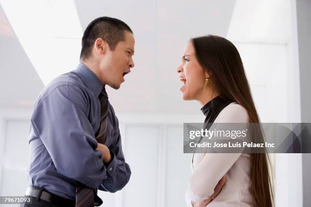 multi-ethnic businesspeople yelling at each other - disagreement at work stock pictures, royalty-free photos & images