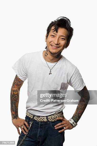 asian man in rockabilly clothing - rockabilly stockfoto's en -beelden