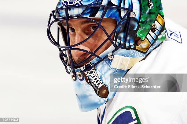 Goaltender Roberto Luongo of the Vancouver Canucks defends the net against the Florida Panthers at the Bank Atlantic Center on February 1, 2008 in...