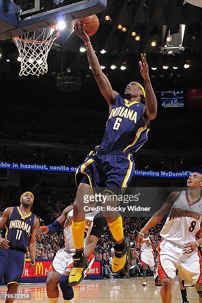 Marquis Daniels of the Indiana Pacers goes up for the shot during the NBA game against the Golden State Warriors on January 13, 2008 at Oracle Arena...