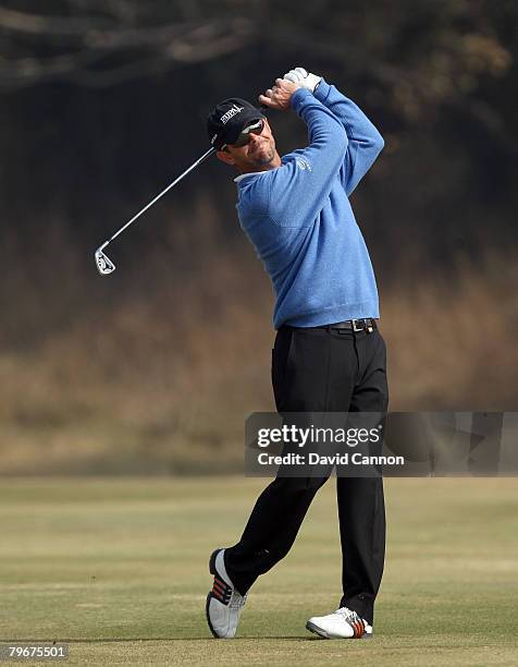 Andrew Coltart of Scotland hits his second shot to the 10th hole during the third round of the Emaar-MGF Indian Masters at the Delhi Golf Club on...