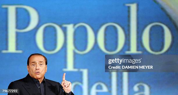 People's Party for Freedom leader Silvio Berlusconi delivers a speech during a meeting in Milan, on February 9, 2008. Italy's Silvio Berlusconi said...