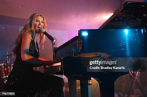 Delta Goodrem performs live at the official launch of the new 'David Jones' store in Queensplaza on February 9, 2008 in Brisbane, Australia.