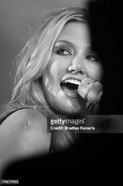 Delta Goodrem performs live at the official launch of the new 'David Jones' store in Queensplaza on February 9, 2008 in Brisbane, Australia.