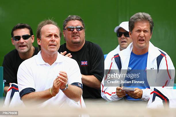 John Lloyd captain of Great Britain gives support with Roger Draper, Peter Lundgren and Louis Cayer of the LTA as Jamie Murray and Ross Hutchins of...