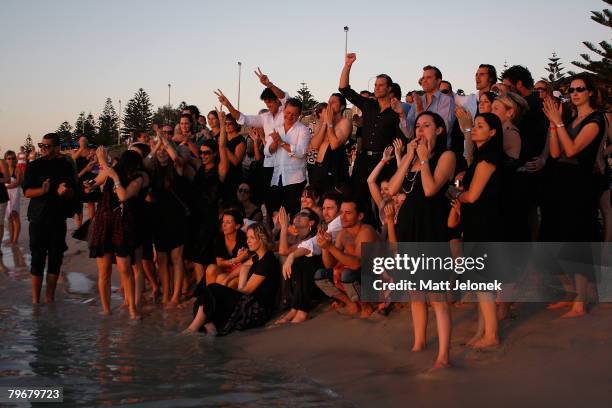 Michelle Williams, Kate Ledger, family and friends watch the sunset in memory of Heath Ledger on Cottesloe Beach on February 9, 2008 in Perth,...