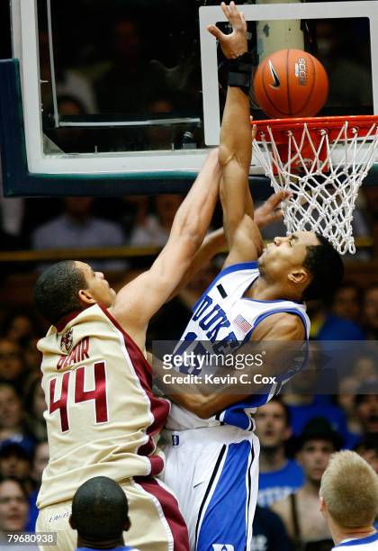 Gerald Henderson of the Duke Blue Devils defends the basket against Tyrelle Blair of the Boston College Eagles during the first half at Cameron...