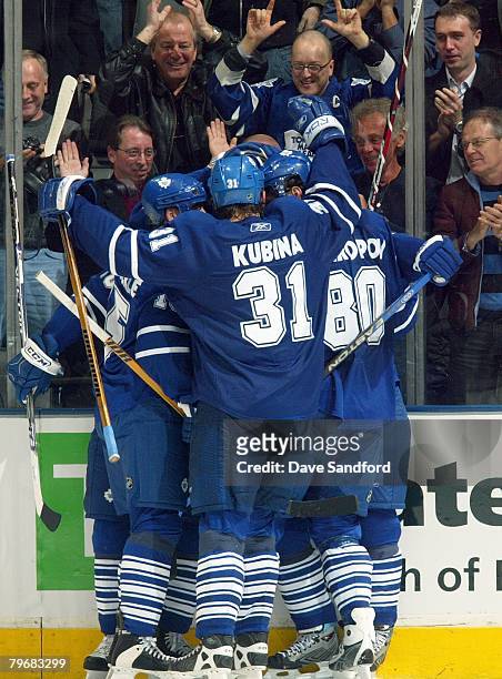 Pavel Kubina of the Toronto Maple Leafs celebrates with teammates against the Washington Capitals during their NHL game at the Air Canada Centre...
