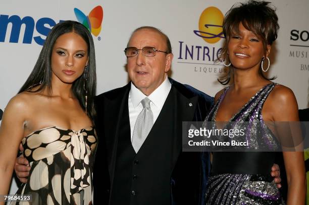 Musician Alicia Keys, Chairman and CEO BMG USA Clive Davis and singer Whitney Houston arrive at the Legendary Clive Davis Pre-Grammy Party held at...