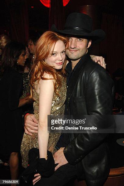 Actress Rose McGowan and actor Robert Rodriguez attend Frank Miller's birthday party at CatHouse at Luxor on February 9, 2008 in Las Vegas, Nevada.
