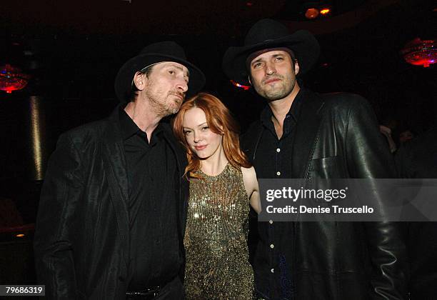 Producer Frank Miller, actress Rose McGowan and actor Robert Rodriguez attend Frank Miller's birthday party at CatHouse at Luxor on February 9, 2008...