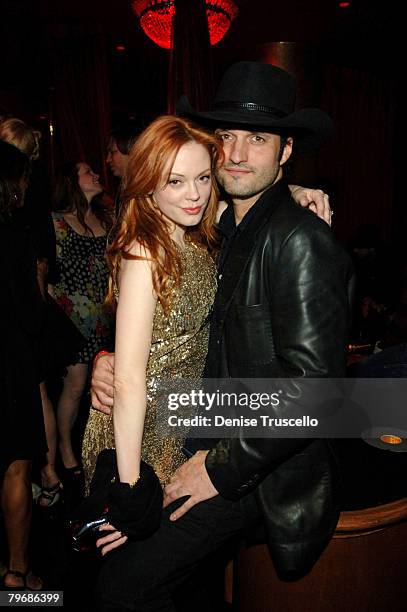 Actress Rose McGowan and actor Robert Rodriguez attend Frank Miller's birthday party at CatHouse at Luxor on February 9, 2008 in Las Vegas, Nevada.