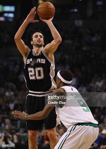 Manu Ginobili of the San Antonio Spurs takes a shot over Rajon Rondo of the Boston Celtics on February 10, 2008 at the TD Banknorth Garden in Boston,...