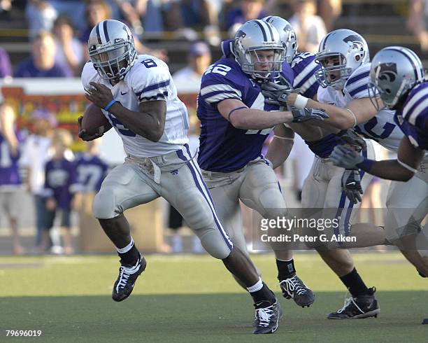 Kansas State running back James Johnson rushes up field for a 33-yard gain in the first half, during the Kansas State Purple & White spring game at...