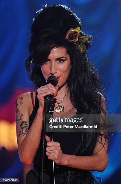 British singer Amy Winehouse performs at The Riverside Studios for the 50th Grammy Awards ceremony via video link on February 10, 2008 in London,...
