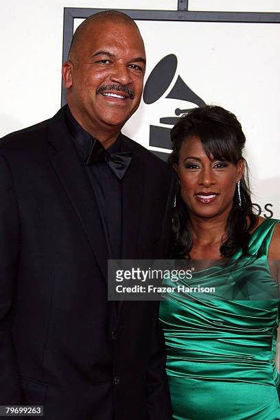 Starbucks president Ken Lombard and guest arrive at the 50th annual Grammy awards held at the Staples Center on February 10, 2008 in Los Angeles,...